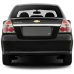 Rear view of a black Chevrolet Aveo LT sedan showcasing taillights and gold bowtie emblem in the center of the trunk lid